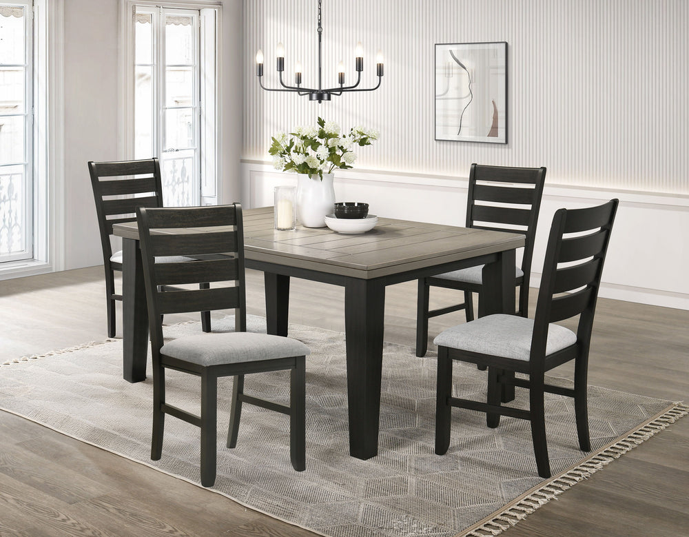 This dining group effortlessly combines farmhouse warmth with modern sophistication, creating a captivating focal point for any dining space. The table features a rich, two-tone design with a beautifully finished wood top and contrasting dark legs, delive