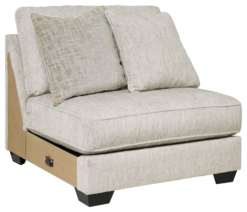 This armless chair is made with polyester upholstery. Pairs with other items in the series to make a sectional.<br><br><b>Additional Dimensions</b><br><ul><li>24-" Toss Pillow: 0-"</li><li>Leg height: 3-"</li><li>Minimum width of doorway for delivery: 32-