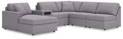 Looking cool and contemporary is great. But when it comes down to it, youâ€™re all about low-maintenance lounging. With the performance fabric on this sectional with chaise, cleaning spills is a breeze. Its customizable modular design caters to your ever-