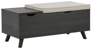 The clean profile of this small storage bench makes an entrance anywhere and everywhere you place it. Replicated blackened wood finish with a grayed textural grain and tapered wood legs lend a fresh flair. Adding form and function, both tops are removable