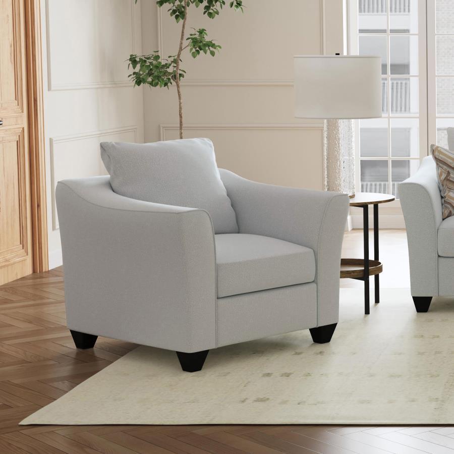 Experience the epitome of luxury and comfort with this exquisite chair. Cloaked in an elegant gray mist upholstery, it offers a soft, soothing palette that enriches any modern living space. The plush cushions, brimming with foam, promise a haven of comfor