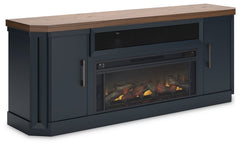 This TV stand combines casual contemporary design with modern appeal. Its combination of a thick-bodied wood-tone top with a slate blue cabinet is a smart choice on so many levels. Stow away electronics in the roomy cabinets, and use the upper shelf to co