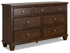 The casual design of this dresser introduces a time-honored look to your restful retreat. Spacious enough to hold all your essentials, the beautifully crafted piece is built to last. Distinctive framing gives the drawer fronts brilliant dimension. Whether