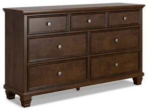 The casual design of this dresser introduces a time-honored look to your restful retreat. Spacious enough to hold all your essentials, the beautifully crafted piece is built to last. Distinctive framing gives the drawer fronts brilliant dimension. Whether