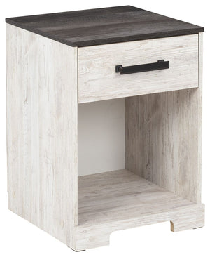 Give provincial a new meaning with the chic look of this nightstand. The two-tone finish keeps this piece light and fresh while the warm pewter-tone hardware adds an industrial touch. The open cubby provides display space or accommodates a storage bin to 
