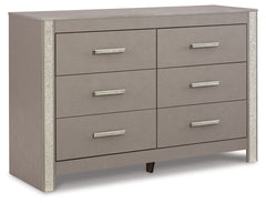 Love sleek and bold contemporary style? Drink in the beauty of this dresser. Its eye-catching details include glam glitter accents and the look of leather grain with a subtle gray finish. Large-scale linear handles, in a sophisticated champagne chrome ton