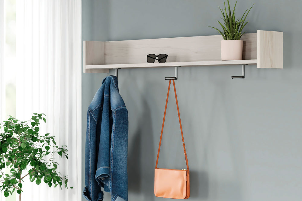The sleek, minimalist look of this wall-mounted coat rack is fashionably contemporary and easy to integrate in a variety of living spaces. Three sturdy hooks and a spacious shelf are your new go-to spot for hats and scarves or displays. Whether by the fro