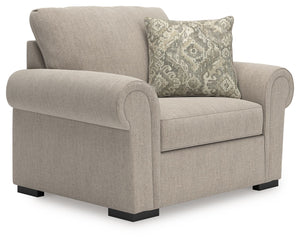 Looking for that perfect blend of timeless and cozy? This oversized chair delivers both, with classic roll arms and soft chenille upholstery that feels like a warm hug. There-'s plenty of space to curl up with a good book or stretch out for an afternoon n