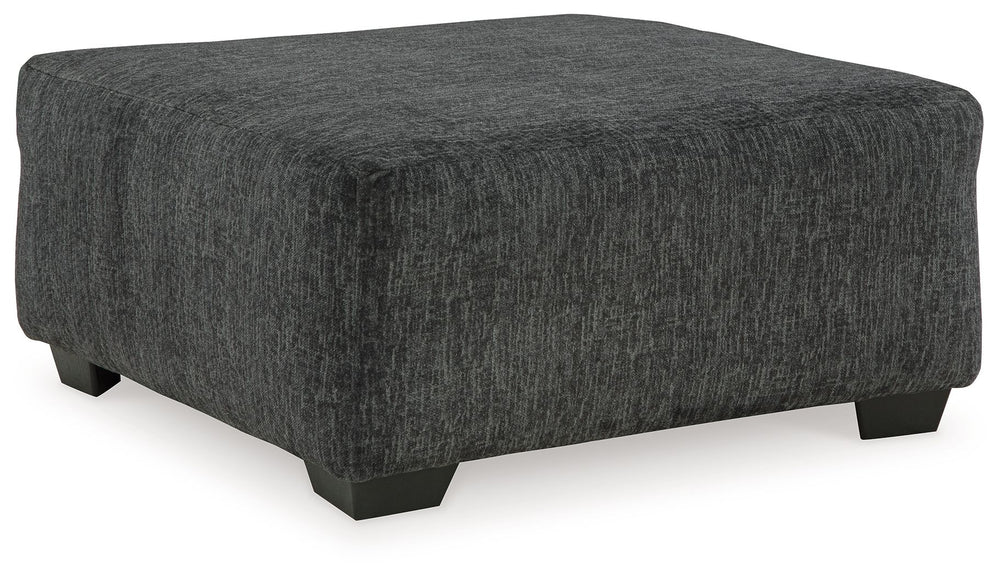 Bring fashionable function to the forefront with this oversized accent ottoman. The transitional design sports a clean-lined silhouette. Dress it up or down. In a richly versatile neutral, this footrest appeals to a variety of style personalities.<br><br>