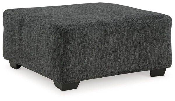 Bring fashionable function to the forefront with this oversized accent ottoman. The transitional design sports a clean-lined silhouette. Dress it up or down. In a richly versatile neutral, this footrest appeals to a variety of style personalities.<br><br>