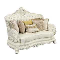 Be the talk of the town with the immaculate Adara sofa. The sofa features a traditional camel back design and a button-tufted backrest for those timeless details. Boasting an extravagant crown molding that is perched on top as a wow factor. The armrests a