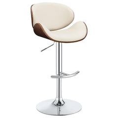 Easily adjustable from counter to bar height, this stool is an elegant option to enhance the aesthetic of an eat-in kitchen. The chrome plated pedestal base comes with an ergonomic foot rest for added comfort. Upholstered in a soft, ecru leatherette and a