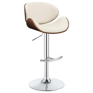 Easily adjustable from counter to bar height, this stool is an elegant option to enhance the aesthetic of an eat-in kitchen. The chrome plated pedestal base comes with an ergonomic foot rest for added comfort. Upholstered in a soft, ecru leatherette and a
