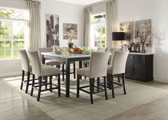 The Nolan marble dining collection offers an elegant design to turn your dining area into the most eye catching spot of your house. Each piece is supported by a strong wooden base in salvage dark oak, contrasting the flawless white marble table top and be