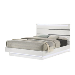 The Paradox Bed in White redefines contemporary elegance with its gleaming white gloss laminate finish that offers both a sleek look and practical benefits such as scratch and water resistance. This bed includes a headboard, footboard, side rails, and a b