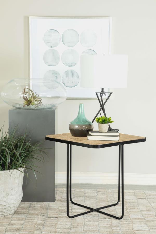 A blend of modern geometry and classic elegance, this square accent table makes a sophisticated statement in any space. The travertine stone tabletop adds a touch of natural beauty, featuring unique textures and organic variations that enhance its charm. 
