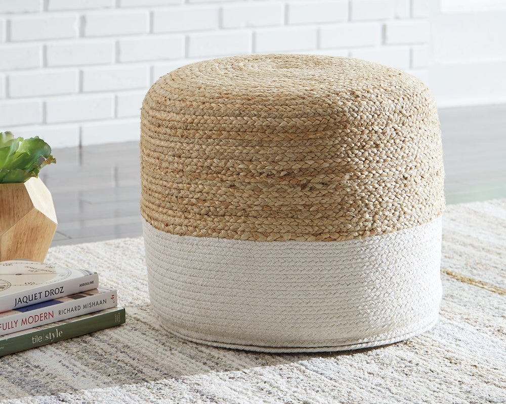 Natural beauty is always in vogue, and this pouf proves it. Braided design in natural jute hue and white is simple yet fresh. Stylish stitching and dense filling hold the look together.<br/><br/><b>Product Features</b><ul><li>Jute/cotton blend cover</li><