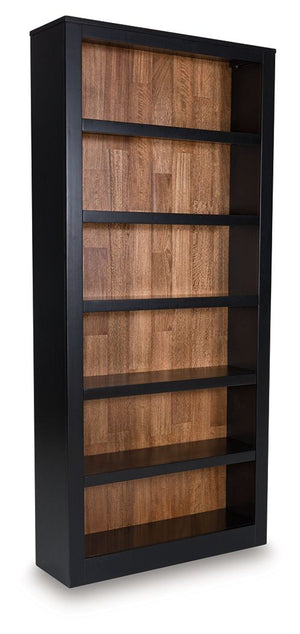 Raise the bar on modern farmhouse style with this home office bookcase. Its casual good looks are accentuated with a two-tone finish, which pairs a warm satin black with a butcher block veneer back in a contrasting rich brown wood tone. Six shelvesâ€”four