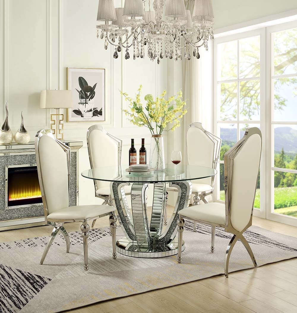 Place this gorgeous Ningbo dining table in any modern setting. The mirrored base durably supports the round clear glass top, which allows the beautiful curves to be highlighted. The panel mirrored base features inlaid faux diamonds that both reflect light