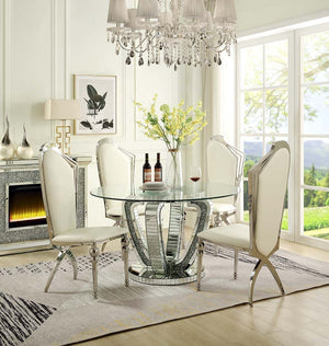 Place this gorgeous Ningbo dining table in any modern setting. The mirrored base durably supports the round clear glass top, which allows the beautiful curves to be highlighted. The panel mirrored base features inlaid faux diamonds that both reflect light