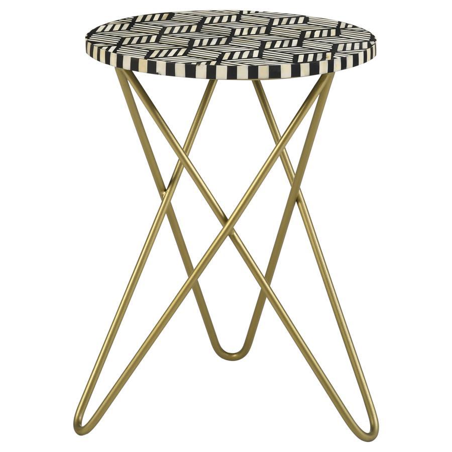 Make a bold statement with this elegant accent table, featuring a hand-inlaid bone and black resin mosaic that creates a striking geometric design. The round tabletop rests atop a sculptural butterfly-style hairpin metal base in a lustrous gold finish, ad