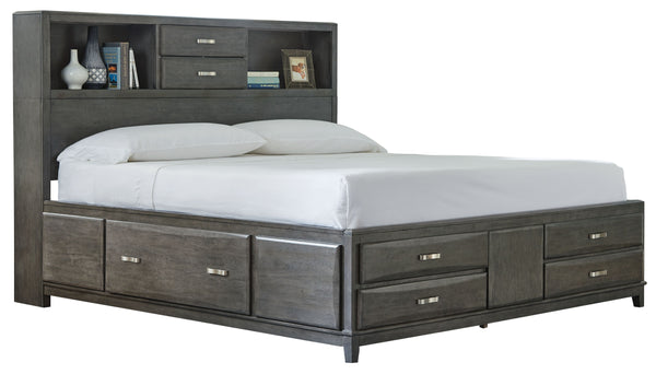 contoured drawers solve small space problems with ease. On each side of the bed a deep drawe
