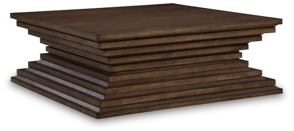 A statement-making table? Yes, please. The distinctive silhouette of this coffee table is sure to captivate lovers of contemporary design. Featuring head-turning architectural geometry and a rich, inviting warm brown finish, this piece is ready to take yo