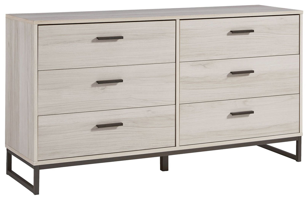Light and bright, this dresser is inspired by chic design. A light natural finish over replicated oak grain offers an authentic touch to this so-cool piece. It beautifully blends the hues of natural living with the edginess of your modern lifestyle.<br><b