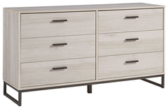 Light and bright, this dresser is inspired by chic design. A light natural finish over replicated oak grain offers an authentic touch to this so-cool piece. It beautifully blends the hues of natural living with the edginess of your modern lifestyle.<br><b