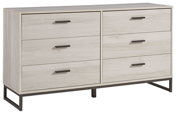 Light and bright, this dresser is inspired by chic design. A light natural finish over replicated oak grain offers an authentic touch to this so-cool piece. It beautifully blends the hues of natural living with the edginess of your modern lifestyle.<br><b