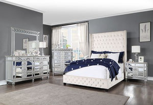 Surround yourself in plush comfort with this statement-making Fabrice bed. The dramatic extra tall, button-tufted, wingback headboard makes your bed the centerpiece of your bedroom. The upholstered headboard and rails are the perfect backdrop for bedding 