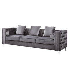 The Bovasis sofa and ottoman are ideal for smaller spaces. In a contemporary design featuring nailhead trim and sturdy metal legs. The beautiful velvet upholstery is soft to the touch and the button tufting adds dimension to the sofa. Pair it with the mat