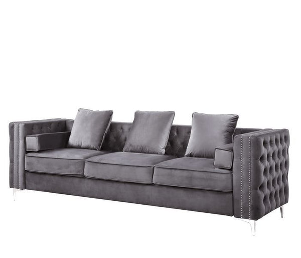 The Bovasis sofa and ottoman are ideal for smaller spaces. In a contemporary design featuring nailhead trim and sturdy metal legs. The beautiful velvet upholstery is soft to the touch and the button tufting adds dimension to the sofa. Pair it with the mat