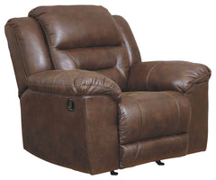 For those who love the cool look of leather but long for the warm feel of fabric, this rocker recliner delivers both with ease. Its high-performance padded faux leather is remarkably durable and easy to clean, making it just the thing for family spaces. C