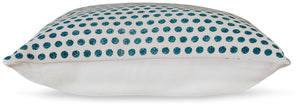  this pillow makes for a cozy additio