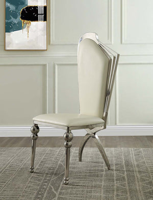 The Cyrene side chairs are padded with high-quality beige leatherette cushions, offering comfort while drawing attention to the elegant chrome finish metal frame. The architectural structure of the frame is eye-catching and glamorous. The foam seats are i