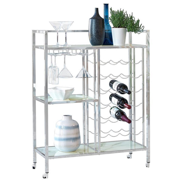 Grace your space with the endless elegance this metal serving cart has to offer. With a stemware rack and space for 24 wine bottles, it-'s the perfect addition to a wine lover-'s home. Sleek metal lines in a gleaming chrome finish give it a polished look 