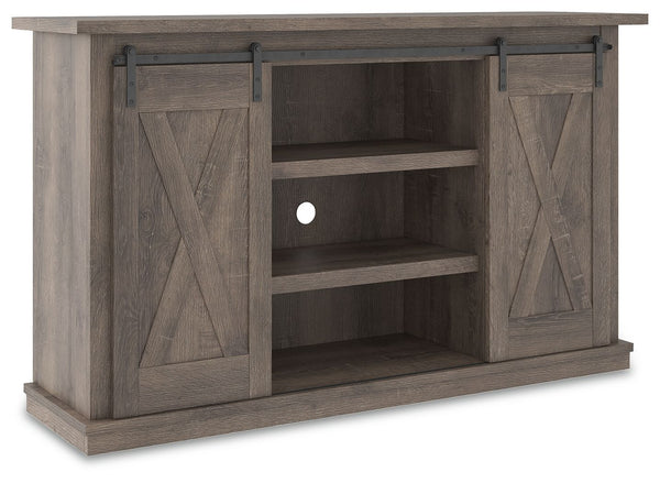With its replicated weathered oak finish, crossbuck details and authentic charm, this TV stand is right in tune with your relaxed approach to high style. Beautifully made to accommodate your media equipment, itâ€™s well equipped with adjustable shelving, 