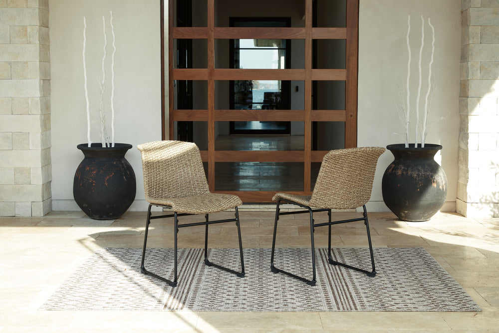 This outdoor dining chair set establishes the standard for alfresco dining. The chair-'s powder coated steel frame and resin wicker seat are ready to withstand the elements for seasons to come. A cool two-tone color scheme adds another layer of interest t