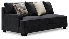 This left-arm facing sofa is made with polyester upholstery. Pairs with other items in the series to make a sectional.<br><br><b>Additional Dimensions</b><br><ul><li>Arm height: 26-"</li><li>Seat depth: 27-"</li><li>Seat height: 21-"</li><li>Top of cushio