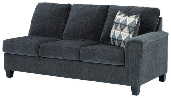 This right-arm facing sofa with corner wedge is made with polyester upholstery. Pairs with other items in the series to make a sectional.<br><br><b>Additional Dimensions</b><br><ul><li>Arm height: 27-"</li><li>Leg height: 4.5-"</li><li>Minimum width of do