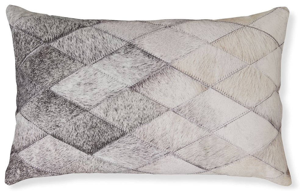 This pillow makes designer-inspired luxury your everyday aesthetic. Faux hair on hide fabric is ruggedly refined, while the diamond pattern recalls the glam appeal of retro art deco design. Itâ€™s a posh, plush addition to your contemporary decor.<br/><br