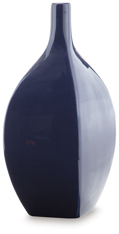 This vase is an effortless display of versatile style. Its navy blue hue makes a chic statement, whether hosting faux florals or standing alone. Sprucing up your outdoor oasis? The vase is durable enough for alfresco use, so you can add decorative flair w