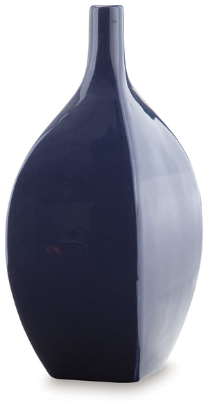 This vase is an effortless display of versatile style. Its navy blue hue makes a chic statement, whether hosting faux florals or standing alone. Sprucing up your outdoor oasis? The vase is durable enough for alfresco use, so you can add decorative flair w