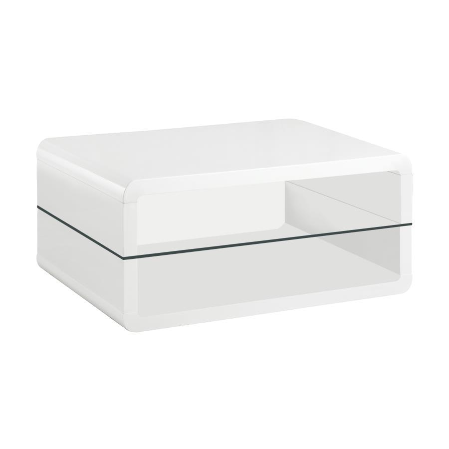 This ultra-modern rectangular coffee table combines a sleek white high-gloss finish with the sophistication of clear tempered glass. Crafted from engineered wood, its smooth, curved edges add a contemporary appeal, while the integrated glass shelf provide