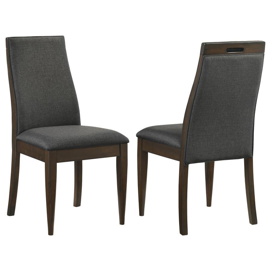 Bring a set of these beautiful contemporary side chairs to your dining table for a sophisticated touch. Designed with elegantly sloped backrests, each dining chair offers an inviting, slender silhouette for restful dining experiences. Across their frames,