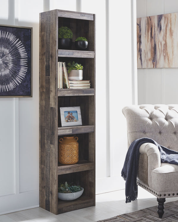 Make this pier TV stand the center of attention with its popular urban eclectic style. Its rustic finish over a replicated pine grain creates an authentic natural look for your home entertainment area. Open storage with adjustable shelving accommodates me