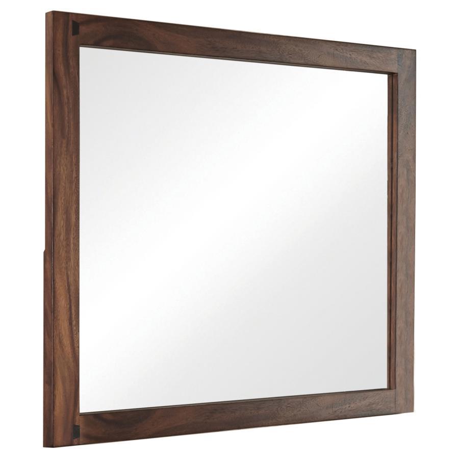 Create a stylish setting for your everyday grooming routine. This strong, sturdy mirror is crafted for quality. Its frame boasts a pleasing finish of smokey walnut. Its large size makes it ideal for a master bedroom. Affix this mirror to a matching dresse