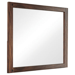 Create a stylish setting for your everyday grooming routine. This strong, sturdy mirror is crafted for quality. Its frame boasts a pleasing finish of smokey walnut. Its large size makes it ideal for a master bedroom. Affix this mirror to a matching dresse