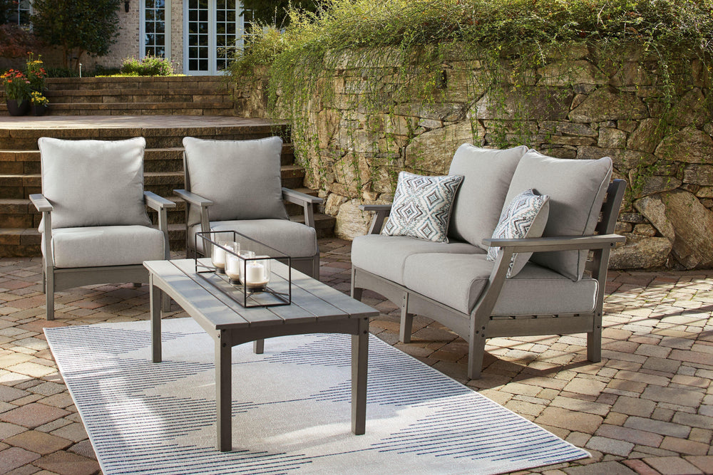 Itâ€™s the dawn of a new day for gray. Embrace the style trend with this loveseat, set of 2 chairs and coffee table set. Crafted of HDPE material that combines the exceptional durability and weather resistance you need with the -"wood look-" you love, thi